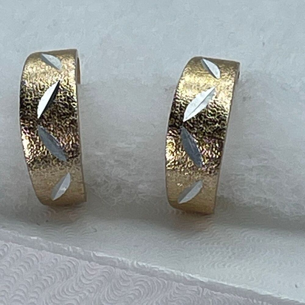 Vintage Hong Kong gold to silver hoop clip earrings.